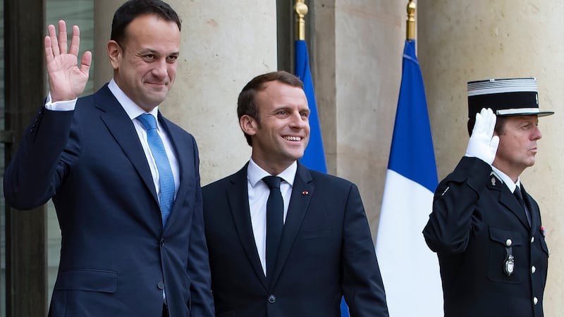 French president Emmanuel Macron (right) greets Taoiseach Leo Varadkar at the Elysee Palace on Tuesday. Photograph: EPA