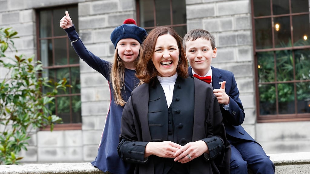 Cathy Smith SC is pictured with her children Saoirse and Darraght at the Four Courts on Wednesday where she was among 23 members of the Bar of Ireland called to the Inner Bar. Photograph: Conor McCabe Photography