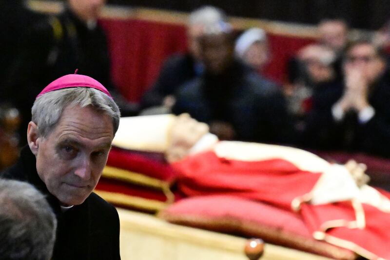 Archbishop Georg Gänswein pays his respect to pope emeritus Benedict XVI as his body lays in state at St Peter's Basilica in the Vatican, on January 3rd. Photograph: Tiziana Fabi/AFP via Getty