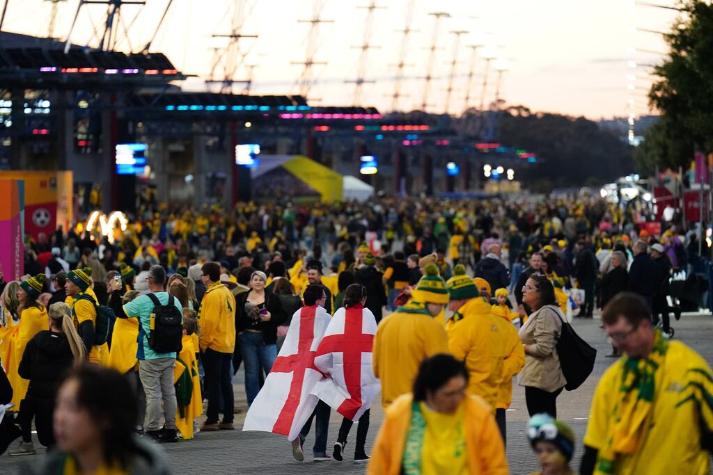 Fans arrive before the Women's World Cup semi-final match between Australia and England at Stadium Australia in Sydney. Photograph: Zac Goodwin/PA Wire
RESTRICTIONS: Use subject to restrictions. Editorial use only, no commercial use without prior consent from rights holder.