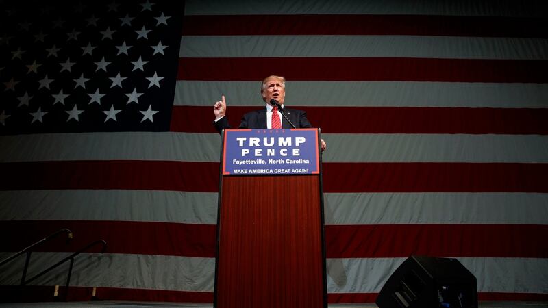 Republican presidential candidate Donald Trump speaks during a campaign rally at Crown Arena, in Fayetteville, North Carolina. Photograph: Evan Vucci/AP