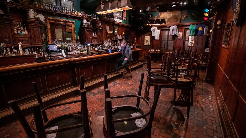 Gavin Coleman, owner of the The Dubliner Restaurant & Pub in Washington DC, in his empty bar on St Patrick’s Day.   The  popular pub near Capitol Hill would normally be crowded with celebrating patrons  from early morning onwards. Photograph: Erik S Lesser/EPA