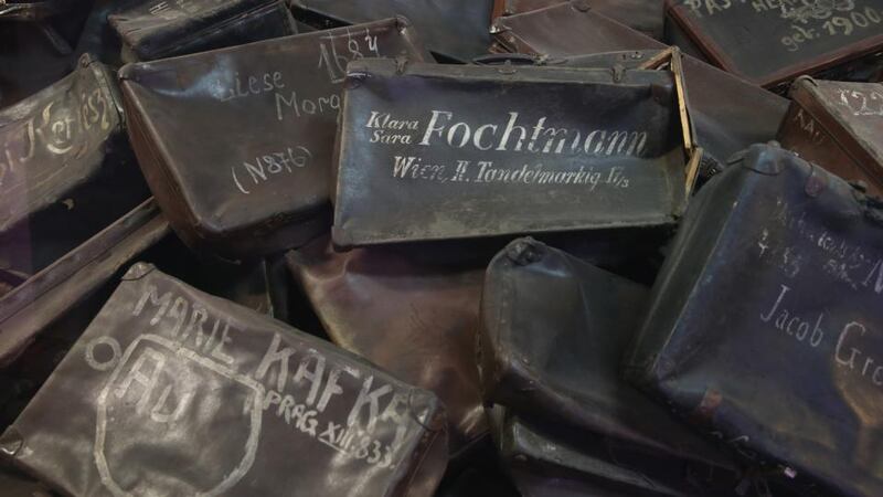 Suitcases confiscated from Auschwitz prisoners lie in an exhibtion display at the former Auschwitz concentration camp. Photograph: Sean Gallup/Getty Images