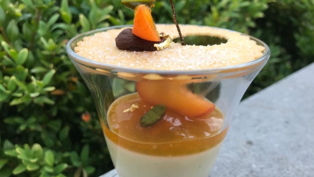 Paul Kelly’s vanilla and orange blossom panna cotta with apricot compote and a sable biscuit.