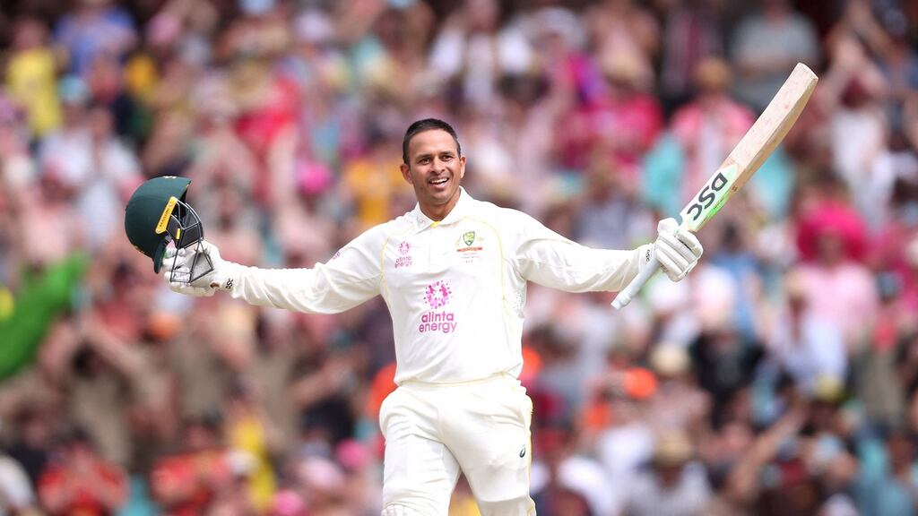 Australia’s Usman Khawaja celebrates reaching his century. Photograph: David Gray/Getty/AFP
