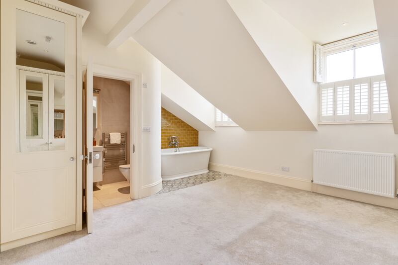 The property has four bedrooms including one with a free standing bath on the second floor