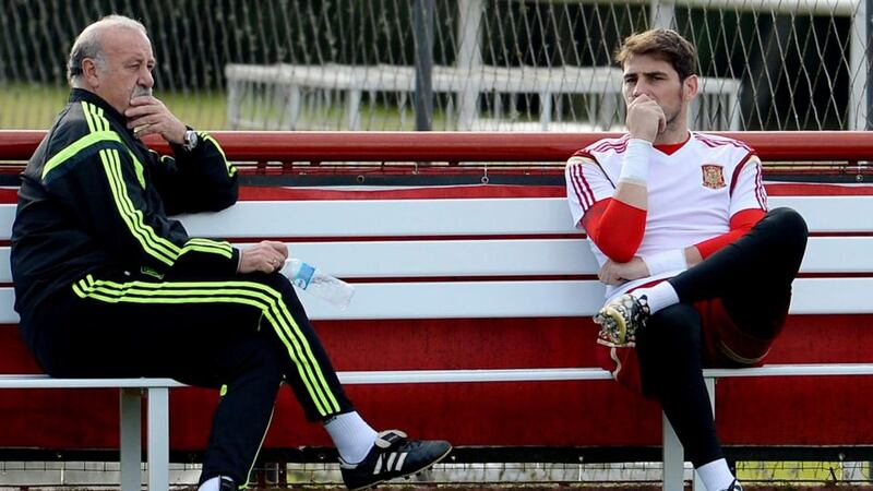 Vicente Del Bosque of Spain (left) talks with goalkeeper Iker Casillas during a training session at the team’s training facilities in Curitiba, Parana, Brazil. Photograph: CJ Gunther/ EPA