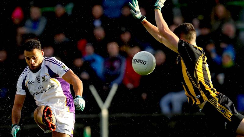 Shane McEntee of St Peter’s Dunboyne blocks  Craig Dias of Kilmacud Crokes during the AIB Leinster Club SFC quarter-final at Páirc Taliteann in Navan. Photograph: Ryan Byrne/Inpho