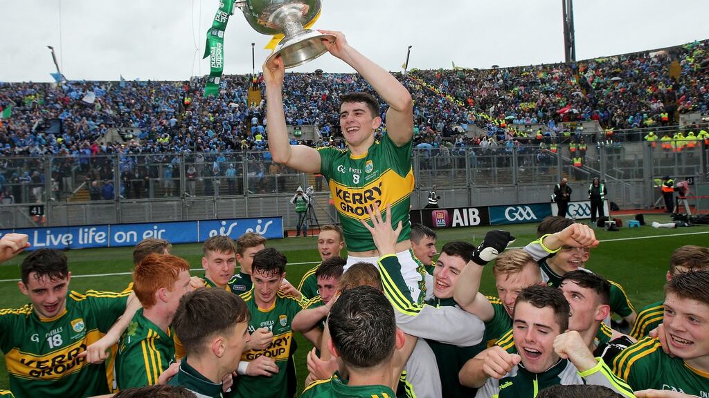 Kerry’s Mark O’Connor celebrates with the trophy after Kerry’s victory in the 2015 All-Ireland minor football championship final . Photograph: Ryan Byrne/Inpho