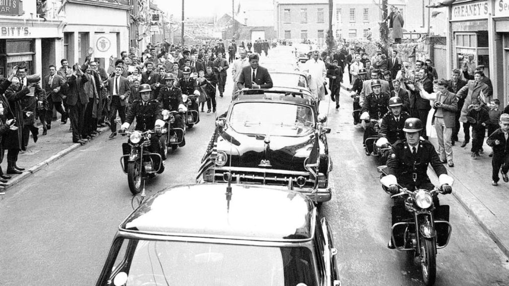 President John F Kennedy travels in an open-top car along Forster Street, Galway city in June 1963. Photograph: Stan Shields