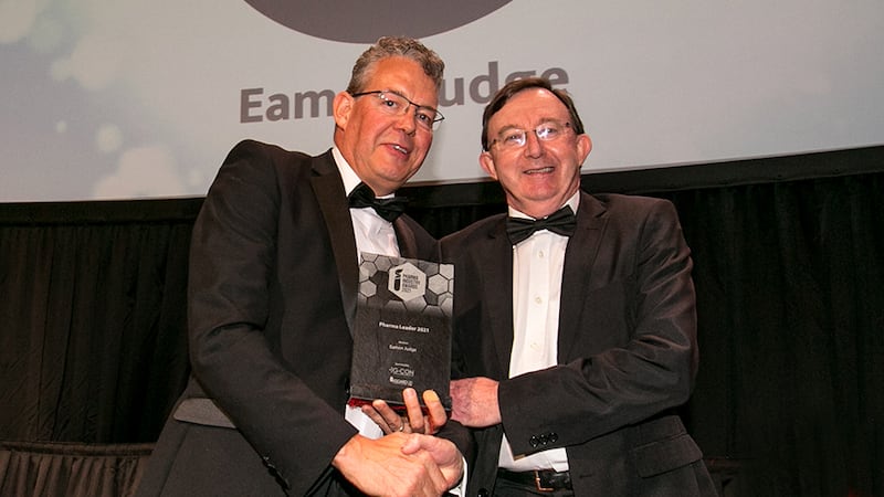 John Comerford, CEO, Asgard Cleanroom Solutions, presents the Pharma Leader 2021 award to Eamon Judge.