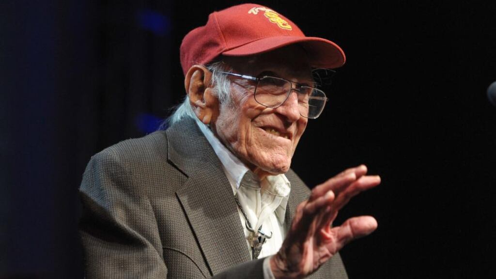 Louis Zamperini, pictured here in 2011, has dies at the age of 97 in Los Angeles. The former Olympian and prisoner of war was the subject of the best-selling book Unbroken. Photograph: Noel Vasquez/Getty Images