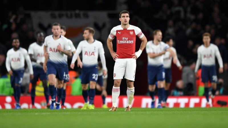 Sokratis Papastathopoulos of Arsenal after Tottenham’s second goal. Photograph: Shaun Botterill/Getty Images