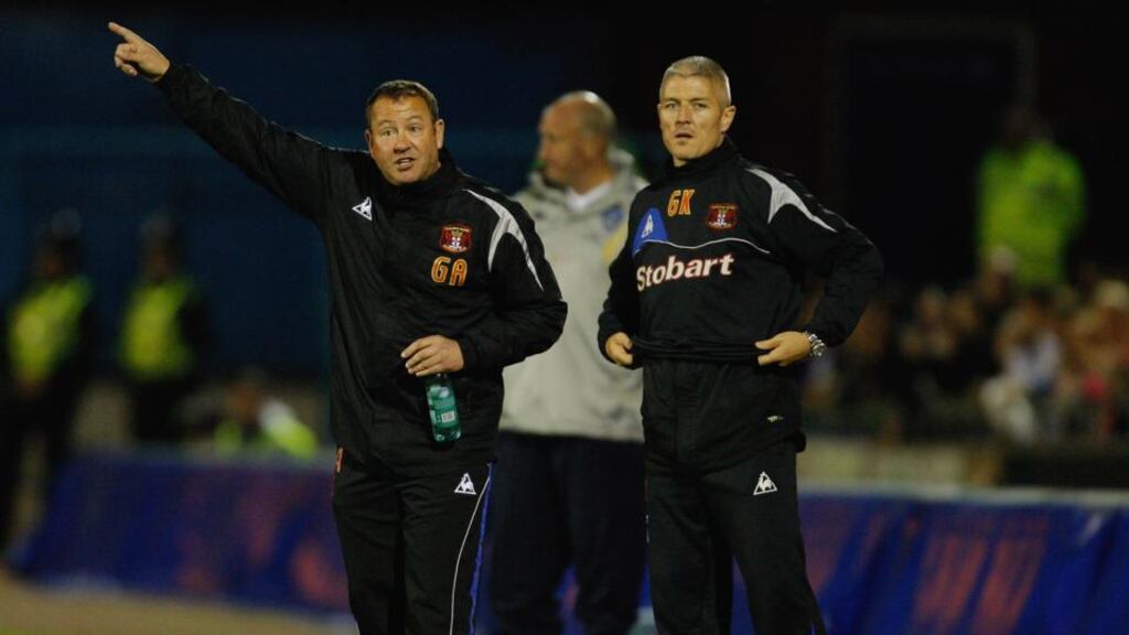 Former  Carlisle United manager Greg Abbott (left) makes a point as his then assistant, and now successor,  Graham Kavanagh looks on Brunton Park. Photograph: Stu Forster/Getty Images.