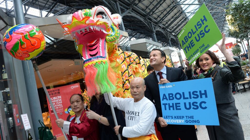 Leo Varadkar TD with Fine Gael Dublin Bay South candidate Kate O’Connell in Dublin, as the party announced their plans to abolish the USC by 2020. File photograph: Dara Mac Dónaill/The Irish Times