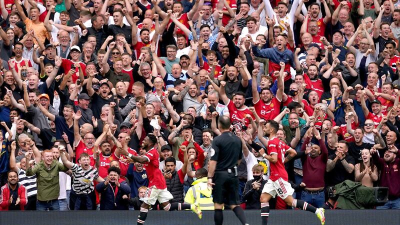Manchester United’s Fred celebrates in front of the fans at Old Trafford after scoring the fifth goal in the Premier League win over Leeds United. Photograph: Martin Rickett/PA Wire