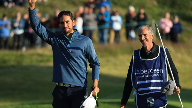 Rafa Cabrera-Bello of Spain celebrates victory with caddie Colin Byrne at the 2017 Scottish Open. Photograph: Getty Images