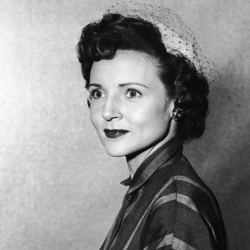 A headshot portrait of American actor Betty White wearing a veiled hat, circa 1955. Photograph: Hulton Archive/Getty Images