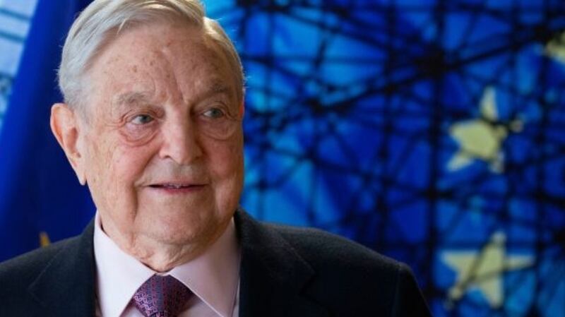 George Soros: Amnesty said the Soros grant accounts for nearly 2.5%  of its total annual income, but returning it would set ‘a dangerous precedent’. Photograph: AFP/Getty