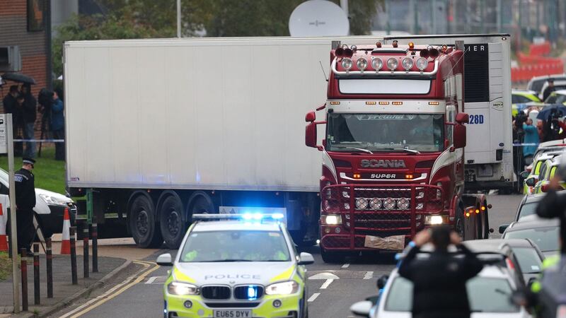 The container lorry where 39 people were found dead inside leaving Waterglade Industrial Park in Grays, Essex. Maurice Robinson (25) has been charged with 39 counts of manslaughter and conspiracy to traffic people over the Grays lorry trailer deaths, Essex Police said.
