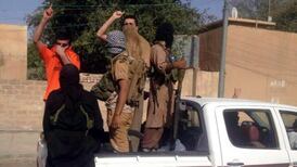 Iraq army capitulates to Isis militants in four  cities