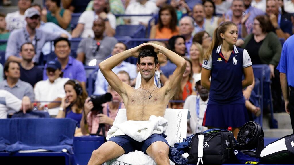 Novak Djokovic during a changeover in his quarterfinal against John Millman in New York. Photograph: AP
