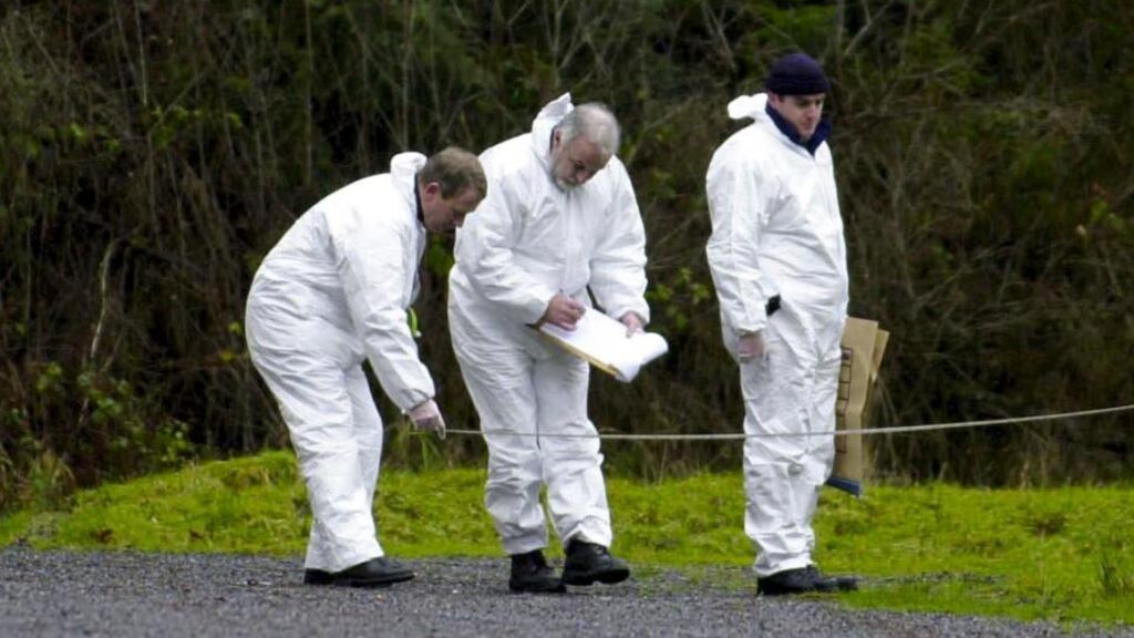 Garda forensic collision investigators at a crash scene. The N54
is currently
was closed between Monaghan and Smithborough today to facilitate an examination after the fatal crash. Photograph: Frank Miller/The Irish Times