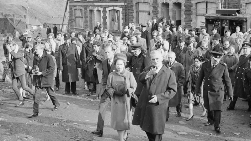 Queen Elizabeth II and Prince Philip visit Aberfan in Wales to comfort the families of the 144 people who died when a coal tip collapsed on the local school. Media coverage of the tragedy was the theme of a recent conference in Cardiff. Photograph: Stan Meagher/Express/Getty Images