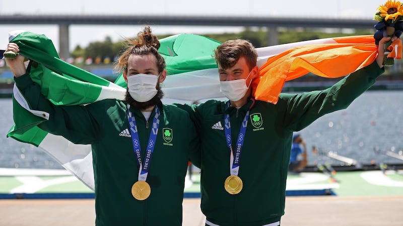 Gold medalists Paul O’Donovan and Fintan Mccarthy of Team Ireland pose with their medals after the lightweight men’s double sculls final a on day six of the Tokyo 2020 Olympic Games at Sea Forest Waterway. Photo: Naomi Baker/Getty Images