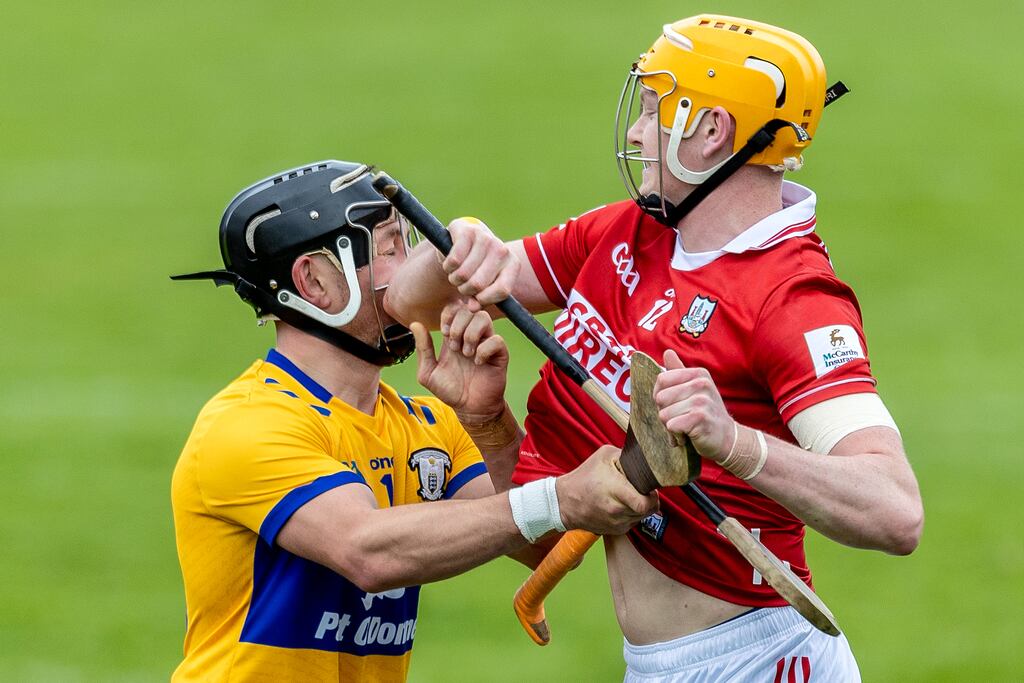 Cork’s Shane Barrett elbows David Reidy of Clare, leading to a red card in their Munster SHC game in Ennis. Photograph: Natasha Barton/Inpho