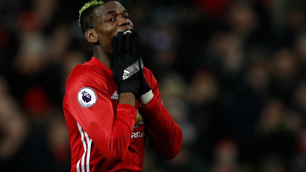 Manchester United’s Paul Pogba reacts after a missed chance against Liverpool. Photograph: Phil Noble/Reuters