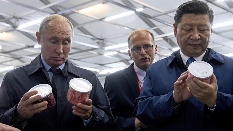 Russian President Vladimir Putin (left) with his Chinese counterpart Xi Jinping inspecting freeze dried fruits and vegetables while visiting the Eastern Economic Forum in Vladivostok, Russia on September 11th Photograph: EPA/Kirill Kudryavtsev