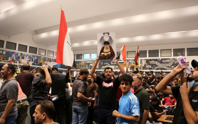Protesters inside the Iraqi parliament building in central Baghdad. Photograph: Ahmed Jalil/EPA-EFE