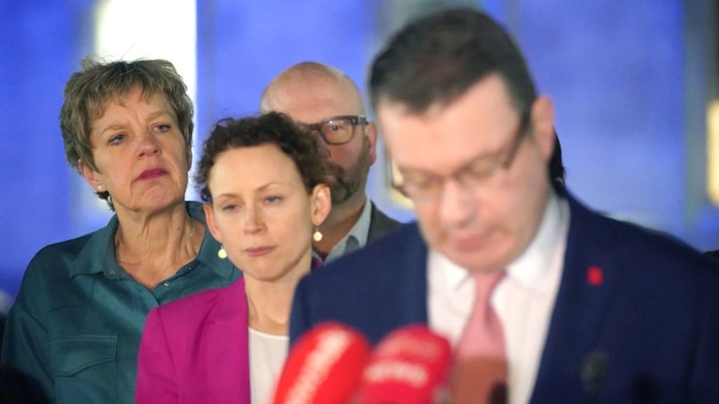 Labour TD Ivana Bacik (left) listens to former Irish Labour Party leader Alan Kelly’s (right) resignation speech outside Leinster House, Dublin on Wednesday evening.  Photograph: Niall Carson/PA Wire