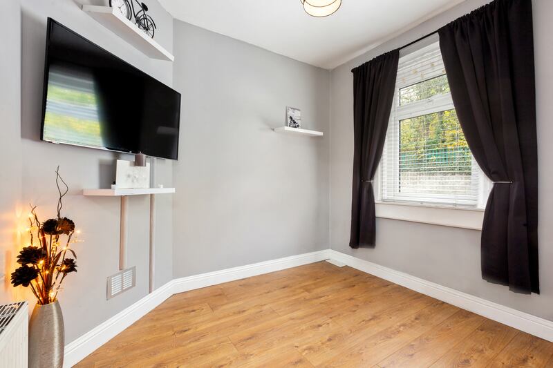 The front room on the right is a versatile space, which could be used as a livingroom, a study or a third bedroom.