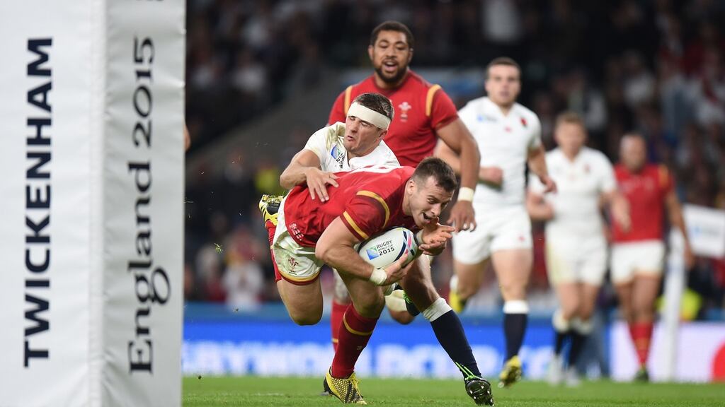 Wales’ Gareth Davies dives to score against England and set-up his side’s famous win at Twickenham. Photograph: PA
