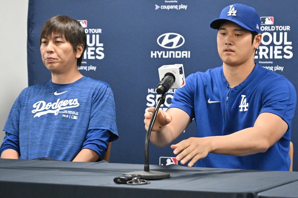 Los Angeles Dodgers' Shohei Ohtani (right) and his ex-interpreter Ippei Mizuhara at a press conference - Mizuhara was fired by the Dodgers last month. Photograph: Jung Yeon-Je/AFP via Getty Images
