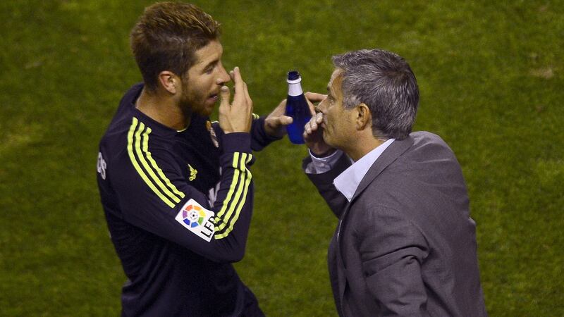 Real Madrid defender Sergio Ramos with his manager Jose Mourinho a league match against Rayo Vallecano in 2012. Photograph: Pierre-Philippe Marcou/AFP/Getty Images