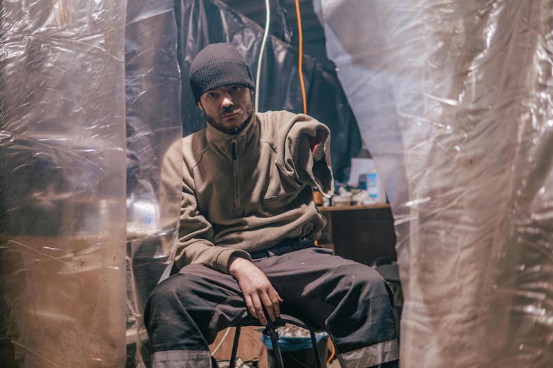 An injured Ukrainian serviceman inside the Azovstal iron and steel works factory in eastern Mariupol, Ukraine, in May. "Basically, we were prepared to die, because the frontline was so far away and it would have cost tens of thousands of lives to save us, " says Oleh Anisimov. Photograph: Dmytro 'Orest' Kozatskyi/AFP via Getty Images