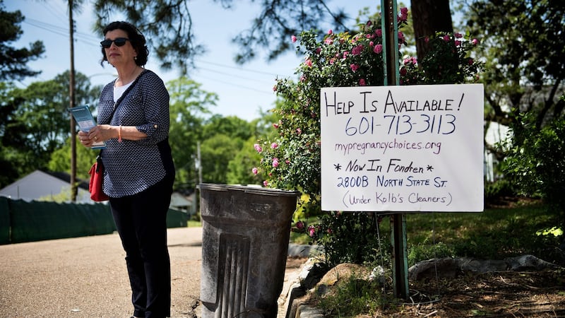 A pro-life activist waits for patients to arrive outside the Jackson Women’s Health Organisation. Photograph: Brendan Smialowski/AFP via Getty