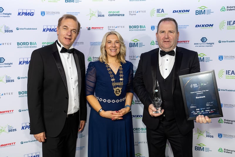 Irish Exporters Association chief executive Simon McKeever, president Gabrielle White, and Martin Winters of Suretank, winner of export innovation of the year category at the Export Industry Awards. Photograph: Karl Hussey Photography