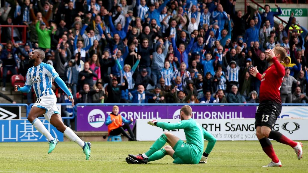 Isaac Mbenza of Huddersfield Town celebrates as he equalises against Manchester United at John Smith’s Stadium in   Huddersfield. Photograph: Alex Livesey/Getty Images