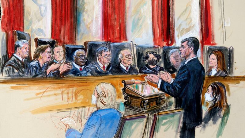 An artist’s sketch of Mississippi solicitor general Scott Stewart, at Wednesday’s hearing. Center for Reproductive Rights litigation director Julie Rikelman is seated right. Justices seated from left are Brett Kavanaugh, Elena Kagan, Samuel Alito, Clarence Thomas, chief justice John Roberts, Stephen Breyer, Sonia Sotomayor, Neil Gorsuch and Amy Coney Barrett. Image: Dana Verkouteren via AP