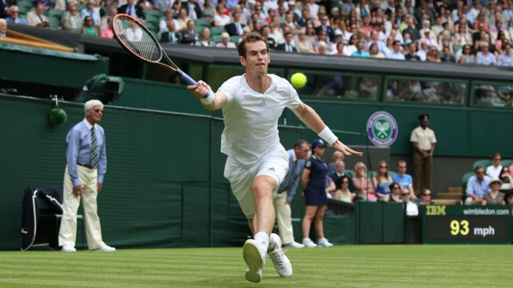 Britain’s reigning men’s singles champion Andy Murray in action against Belgium’s David Goffin during the opening day of the Wimbledon Championships yesterday. Photograph: John Walton/PA