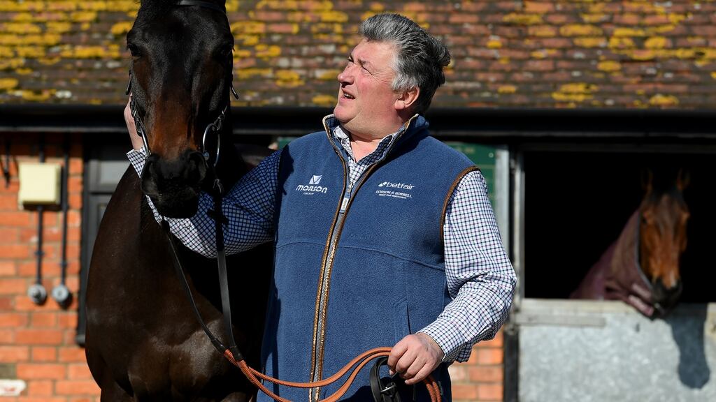 Trainer Paul Nicholls with last season’s King George winner Clan Des Obeaux. Photograph: Alex Davidson/Getty Images