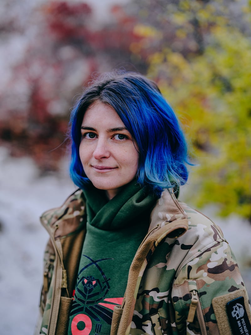 Yulia Mykytenko poses for a portrait at the shooting range in Donetsk. Photograph: Julia Kochetova