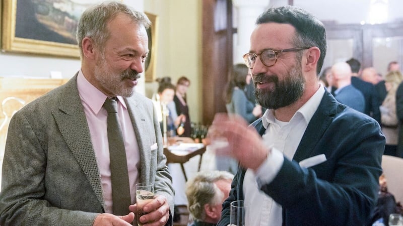 Graham Norton with the artist Gareth Reid. The latter’s portrait of Norton won the Sky Portrait Artist of the Year award