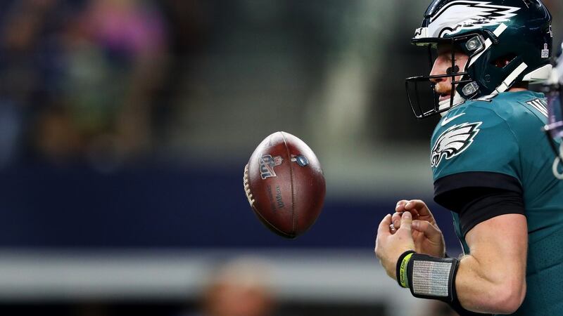 Philadelphia Eagles quarterback Carson Wentz fumbles a snap against the Dallas Cowboys. Photograph: Tom Pennington/Getty
