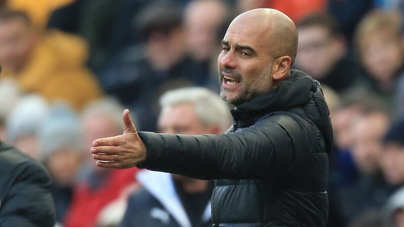 Manchester City’s   manager Pep Guardiola reacts during   match. Photo: Getty Images