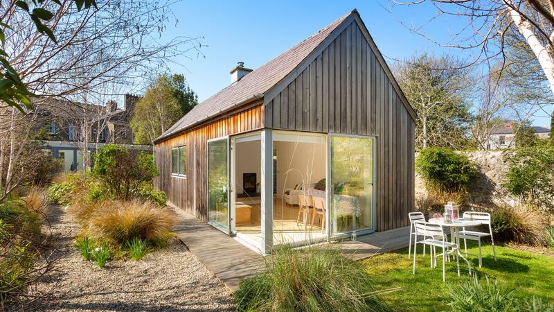 Tucked away towards the end is the cedar-clad garden house – a separate 480sq ft/45sq m one-bed with kitchenette and living area